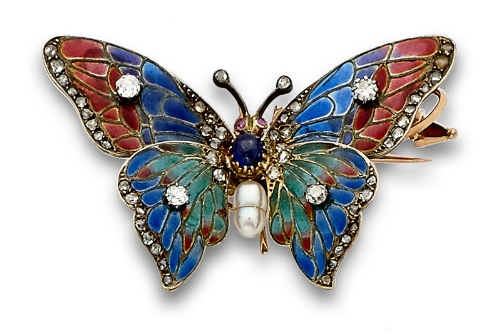 Elegante broche mariposa de pp s.XX con esmalte pilqué à jour en tonos rubi,zafiro y esmeralda. En