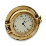 Reloj despertador HERMES de ffs años 60 con cuerda para 8 días. Caja circular ,a modo de ojo de