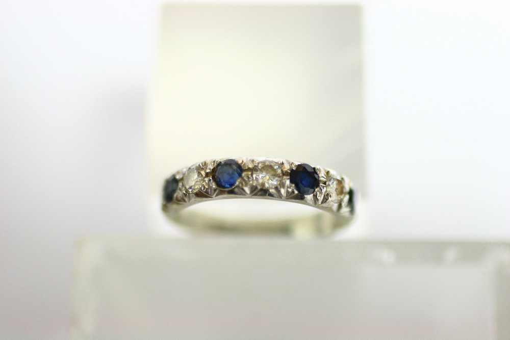 An 18ct. white gold ring set row of alternating diamonds & sapphires. - Image 2 of 2