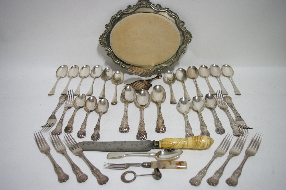 Twelve Hanoverian rat-tail table spoons; nineteen items of King’s pattern flatware; an oval bread