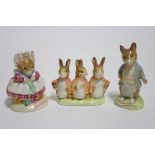A Beswick Beatrix Potter figure “The Old Woman Who Lived In a Shoe – Knitting”; another, “Flopsy,
