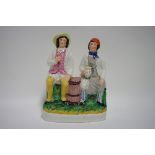 A Victorian Staffordshire pottery large flat-back group titled: “Tam O. Shanter & Sooter Johnny”