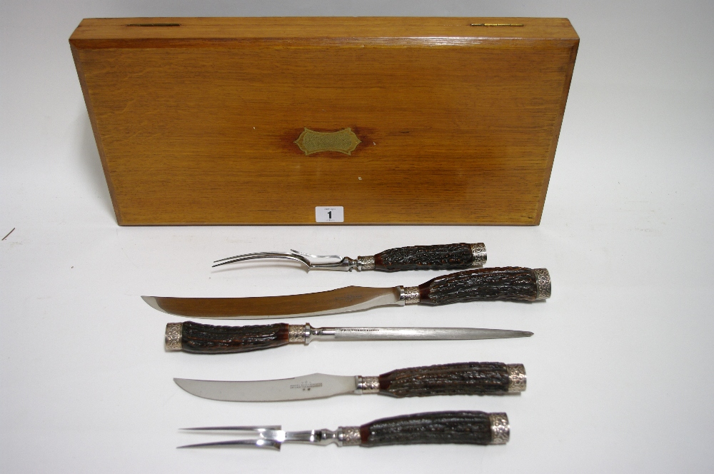 A Joseph Rodgers & Sons five-piece carving set, each with antler handle & embossed ferules; in