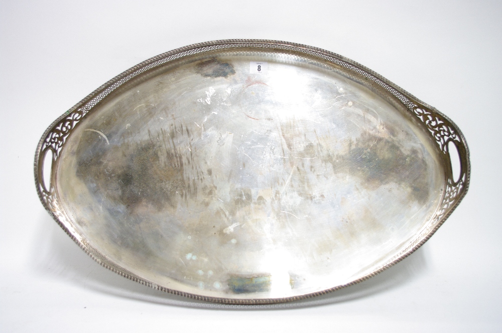 A large oval two-handled tea tray with gadrooned rim to the pierced gallery, on four bun feet; 26" x - Image 2 of 2
