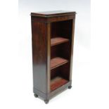 A mid-19th century inlaid mahogany narrow standing open bookcase fitted two adjustable shelves, on