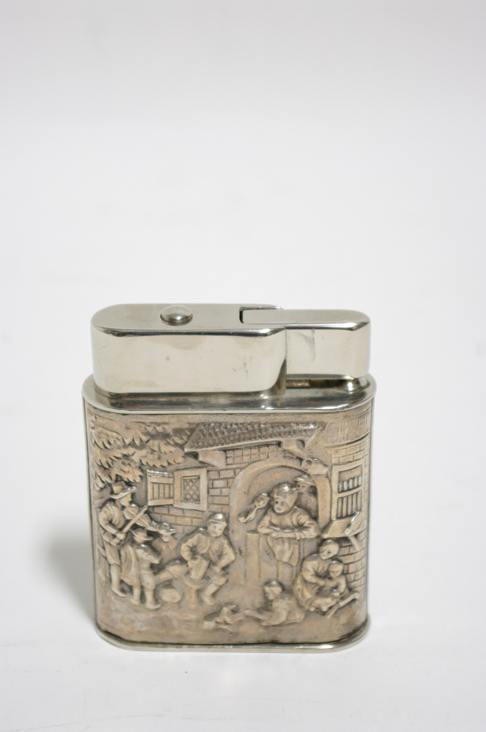 A large table cigarette lighter, the sides encased in Dutch .833 standard silver, embossed with