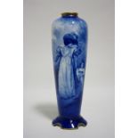 A Royal Doulton porcelain slender vase of tapered oval section, painted in blue with an elegant lady