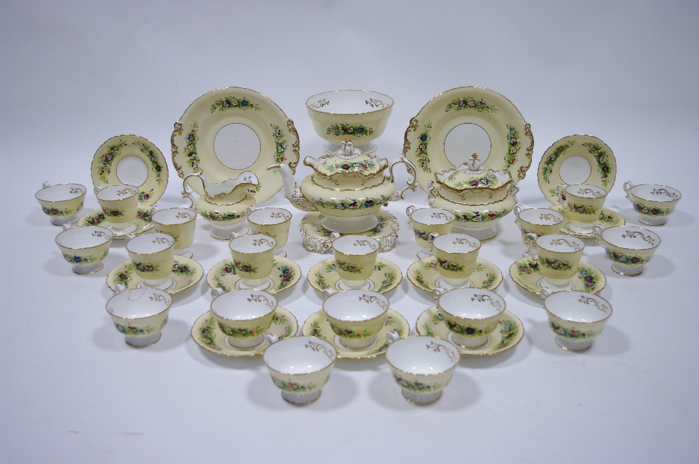 A COPELAND & GARRETT PORCELAIN TEA & COFFEE SERVICE decorated with sprays of pansies on a pale