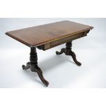 A William IV mahogany centre table with rectangular top, on turned end supports & curved legs with