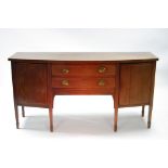 A regency-style inlaid mahogany bow-front sideboard, fitted two central frieze drawers & cupboard