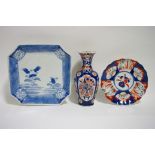 A Japanese blue & white porcelain square dish, 10¾" wide; an Imari ovoid vase with narrow neck,