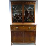 A REGENCY MAHOGANY SECRETAIRE BOOKCASE enclosed by pair lattice glazed doors above a fitted