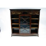 A CHIPPENDALE STYLE MAHOGANY BOOKCASE with blind-fret friezes & carved pendant bell-flowers to the