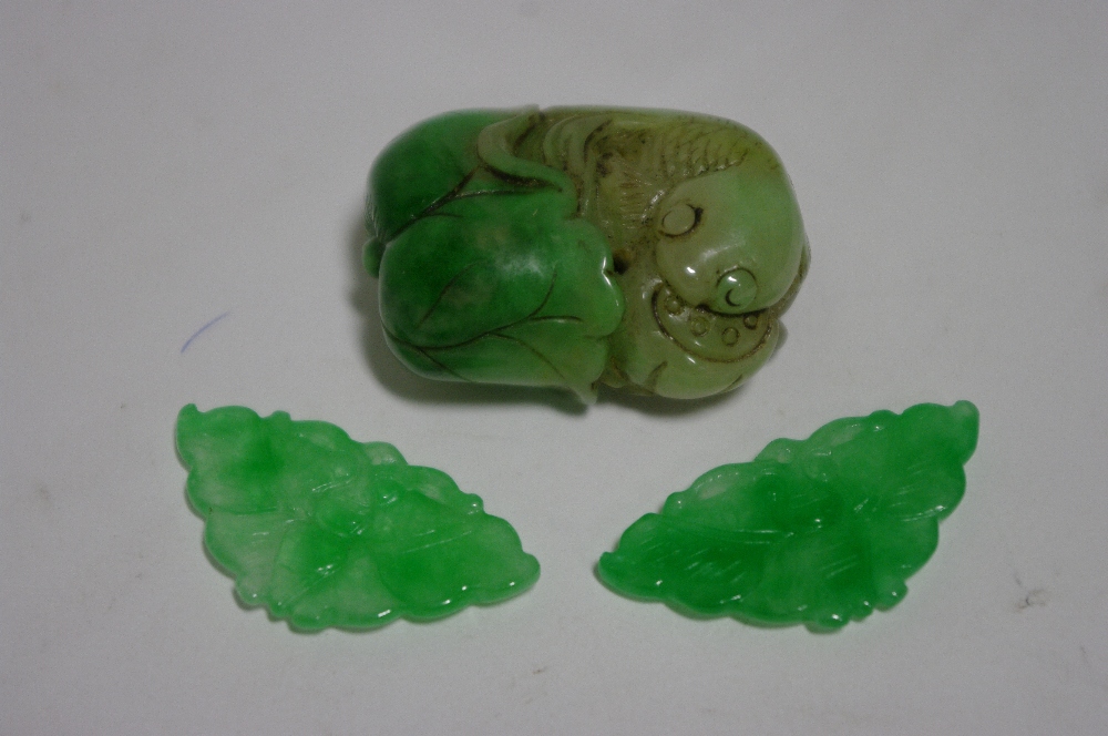 A Chinese green & mutton-fat jade carving of a fish amongst lily pads, 1½” high; & a pair of semi-