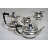 A regency-style four piece tea & coffee service of compressed oblong form, each with narrow