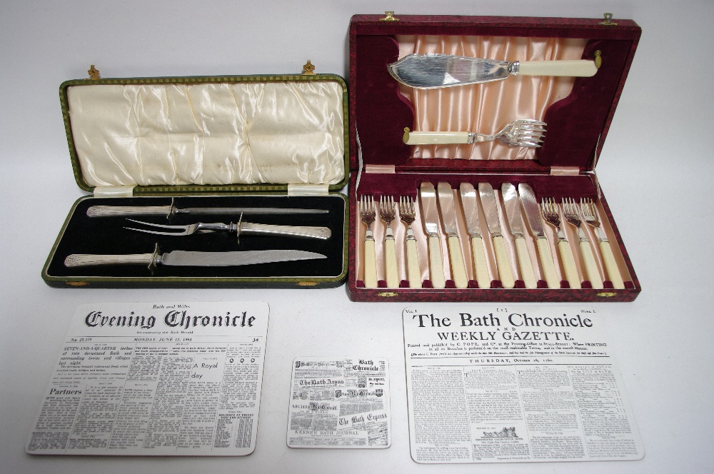 A set of three carvers with Art Deco-style handles in fitted case; six pairs of fish eaters & pair