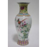 A Chinese republican period porcelain ovoid vase painted in famille rose enamels with birds &