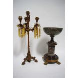 A 19th century cast gilt-metal three branch candelabrum with raised central sconce & hung with glass