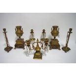 A 19th century gilt-metal twin branch dwarf candelabrum hung with glass prism drops, 8”; a pair of