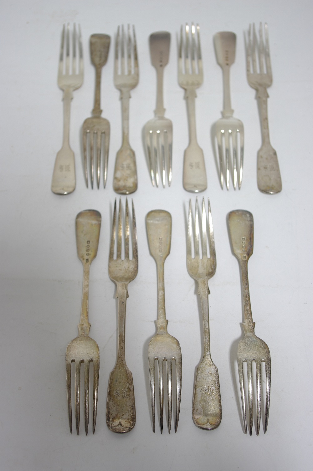 Twelve Victorian Fiddle pattern dessert forks; London 1876, by Goldsmiths’ Alliance (Samuel