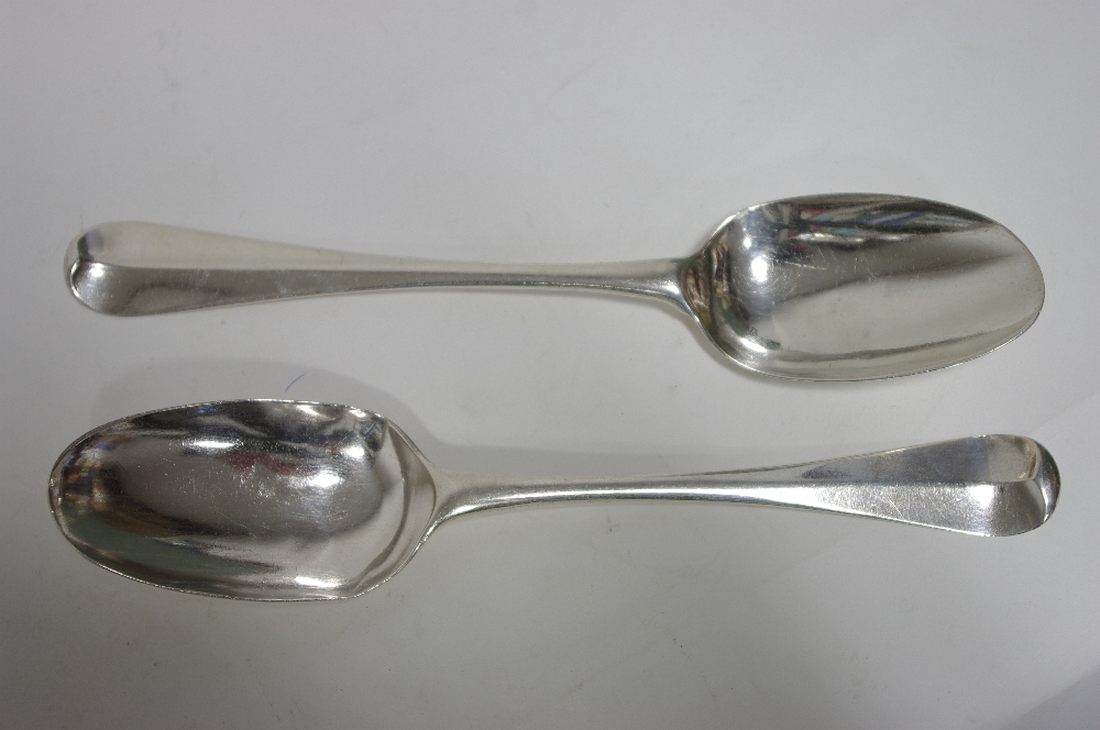 A George II Hanoverian table spoon, London 1730, by Edward Pocock; & another, date letter distorted,