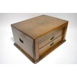 An oak canteen with lift-lid, fitted two drawers, & contents of various flatware & cutlery.