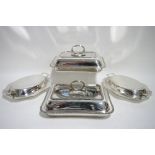 Two rectangular entrée dishes with gadrooned borders & detachable ring handles; & a pair of oval
