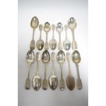 Twelve Victorian Fiddle pattern dessert spoons; London 1878, by George W. Adams (19oz.); & a pair of