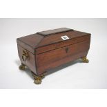 A regency satinwood rectangular tea caddy with hinged lid, pressed brass ring side handles & paw