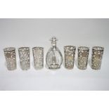 A Haig’s “Dimple” whiskey decanter, & six glass beakers, all with Mexican Sterling engraved mounts.