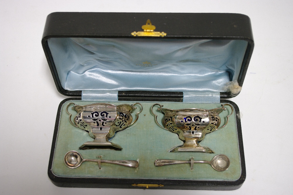 A pair of Edwardian oblong two-handled salt cellar with pierced sides & blue glass liners, each on - Image 2 of 2