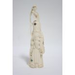 A JAPANESE CARVED IVORY OKIMONO & SHIBAYAMA DECORATED FIGURE OF JUROJIN, standing with his long