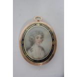 A PORTRAIT MINIATURE, English School late 18th century, depicting a young lady with long curling