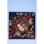 A 19th century ARMORIAL BEARING in the form of a hatchment, with the arms of Scott impaling Wynne,