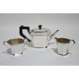 A George V three-piece tea service of square tapered form with canted corners & narrow zig-zag