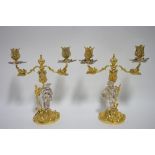 A PAIR OF CAST SILVER & SILVER-GILT ROCOCO STYLE CANDELABRA, each with twin scroll arms supported by