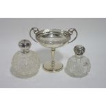 A small circular tazza with pierced rim & leaf-scroll side handles, on slender baluster stem &