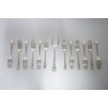 A set of twelve cake forks with fancy terminals, & a matching serving fork; Sheffield 1919, by J.