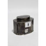 A George V tea caddy of straight-sided oblong form, with serpentine corners, hinged slightly domed