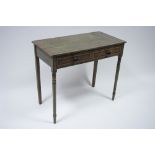 A 19th century painted side table fitted two frieze drawers with turned knob handles, on slender