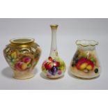 Three Royal Worcester porcelain small vases painted with still-life studies of fruit, one by Kitty