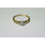 A diamond solitaire, the brilliant-cut stone weighing approx. 0.3 carat, set to an 18ct gold shank.
