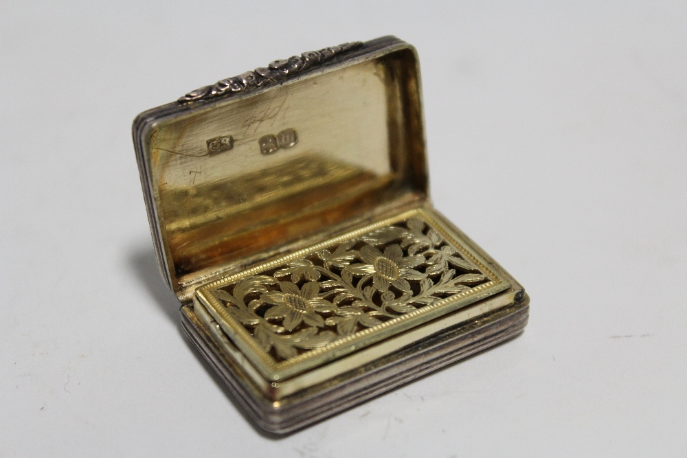 A George IV rectangular vinaigrette with reeded exterior, the gilt interior with pierced floral - Image 2 of 3