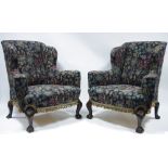 A PAIR OF MID-18th CENTURY STYLE WING-BACK ARMCHAIRS with curved arms & wide sprung seats