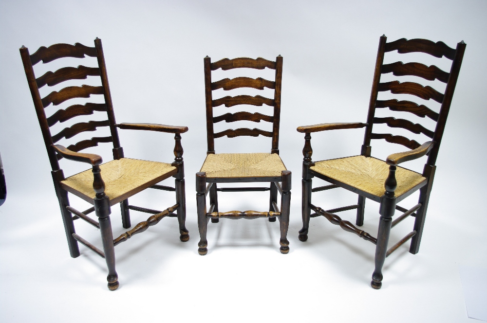 A set of seven Lancashire-type ash dining chairs – including a pair of carver chairs – having