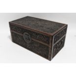 A CHINESE HUNG MU HARDWOOD RECTANGULAR BOX, the hinged lid, front & sides with finely carved