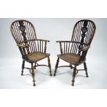 A PAIR OF 19th century YEW & ELM WINDSOR ELBOW CHAIRS with intricately pierced shaped splats to