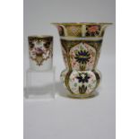A Royal Crown Derby porcelain round flared vase with squat round body, pattern No. 1128, 5¼” high; &