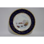 A Royal Crown Derby porcelain cabinet plate with gilt gadrooned rim, deep blue & gilt decorated