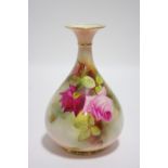 A Royal Worcester porcelain squat round vase with narrow neck, of blush-ivory ground, painted with